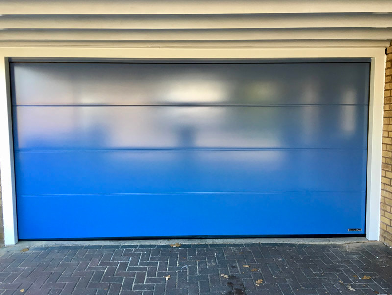 Hormann pidgeon blue garage door installed after
