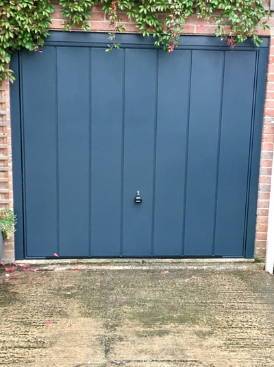 anthracite grey up and over garage door installed in Sheffield
