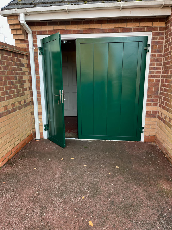 green garage door installed